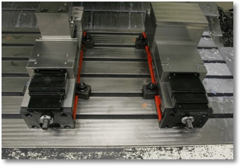Maschinentisch mit AFM T-Nuten Abdeckung® Maschinentisch mit AFM T-Nuten Abdeckung®